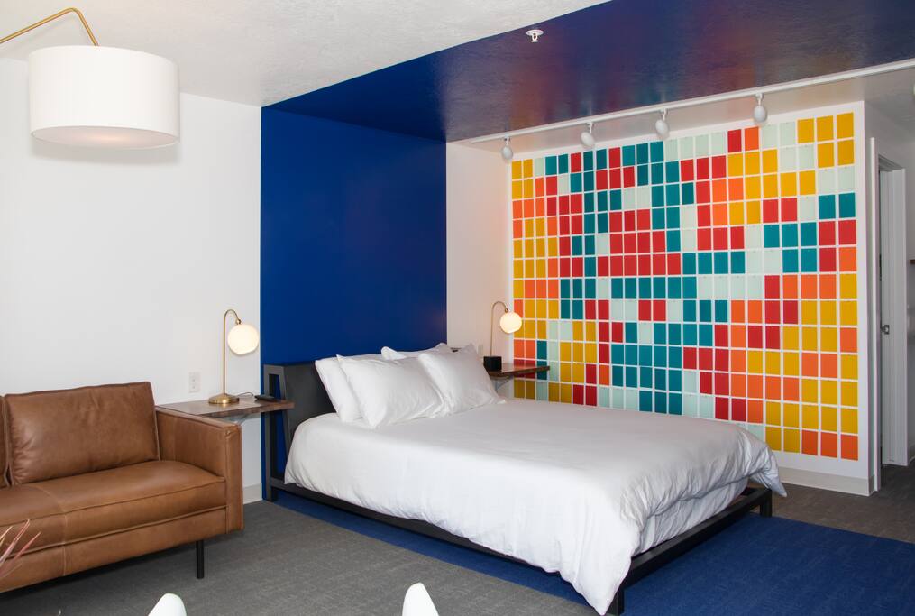 Crystal Geyser Guestroom with custom artwork by the owner, Nicholas