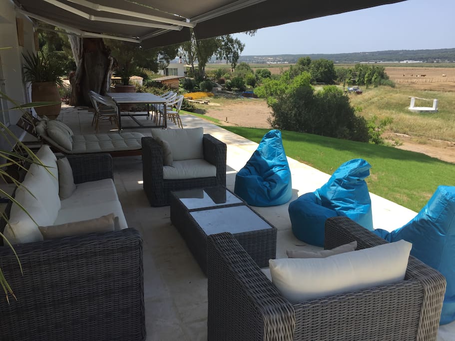 Main terrace with view towards play area (with boat) and casita at the back