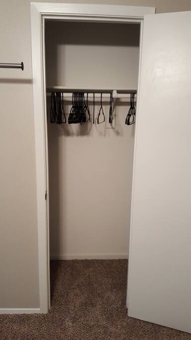 Closet: Use this or the racks in the room to hang clothes.