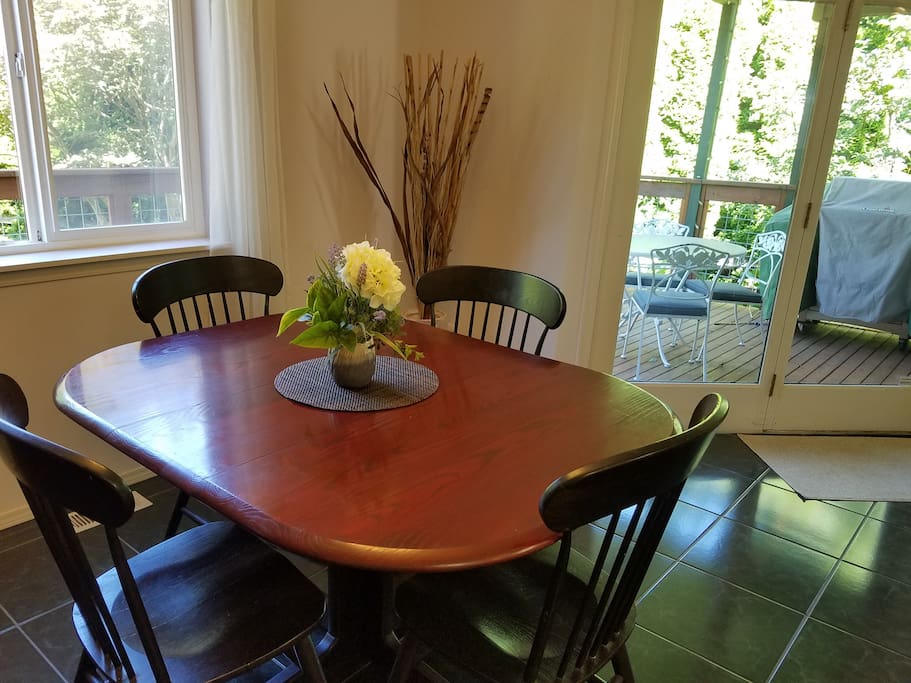 Dining table easily expands to seat 6 or more.