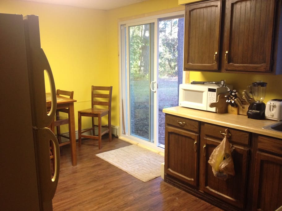 Kitchen: full sized fridge, electric stove w/ oven, electric range, toaster, blender, George Foreman grill, microwave, dishes/cooking supplies