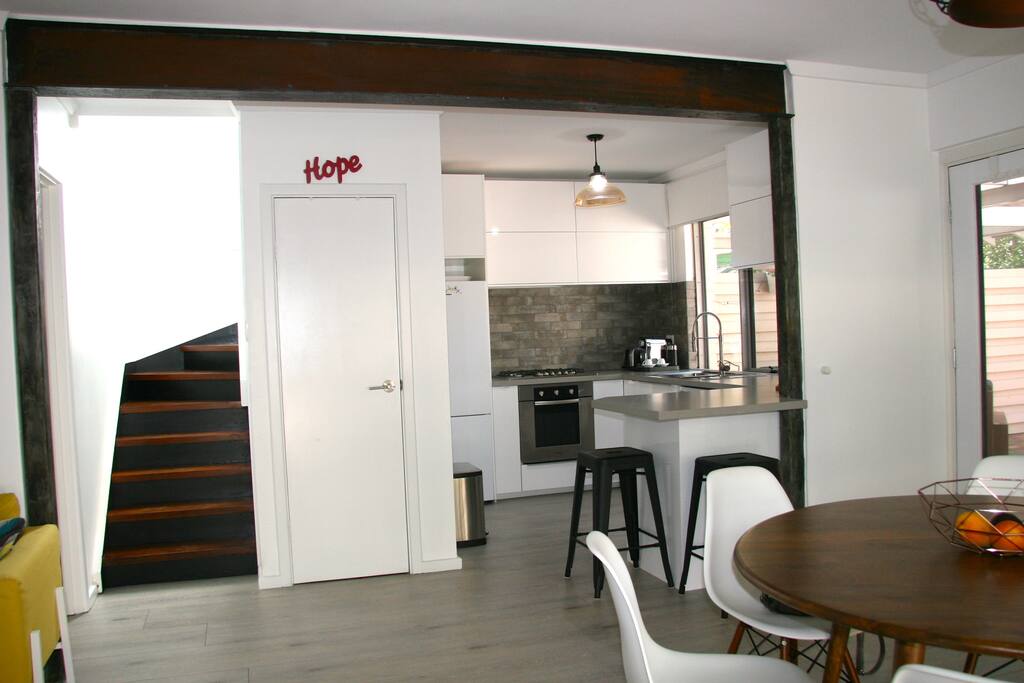 Fully equipped kitchen with view to rear courtyard