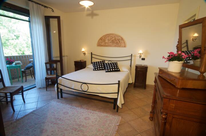 The double  bedroom with private bathroom and terrace on the first floor