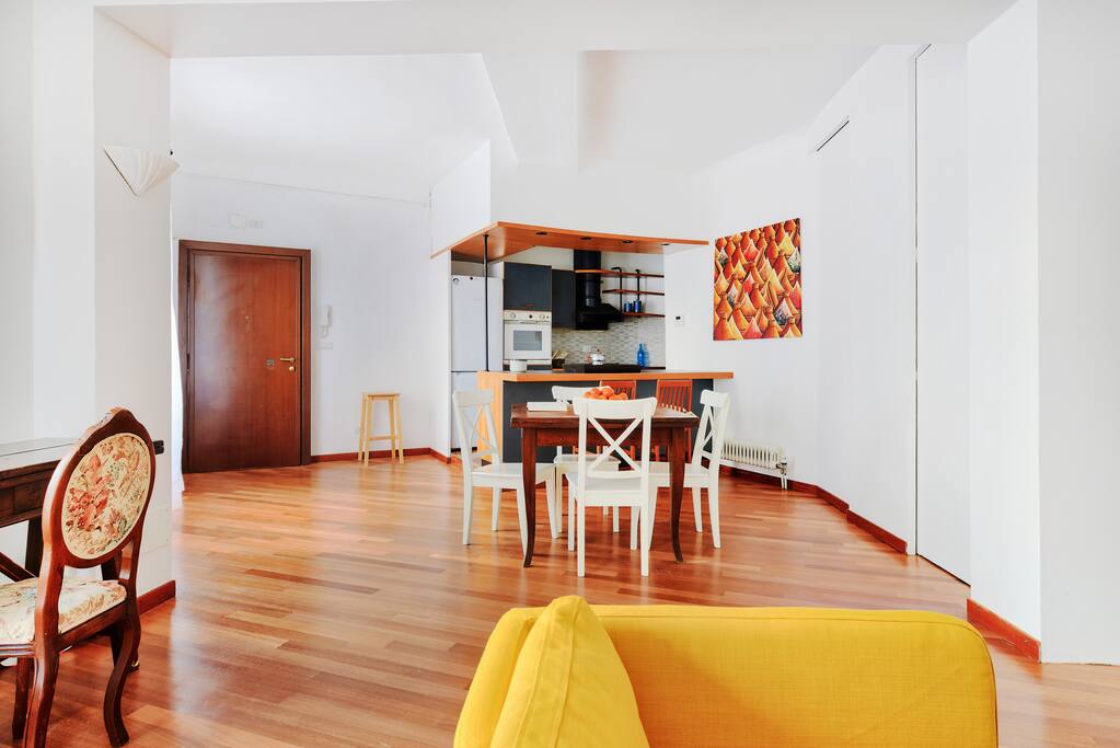 The Living room - The main entrance, the Kitchen & the dining table