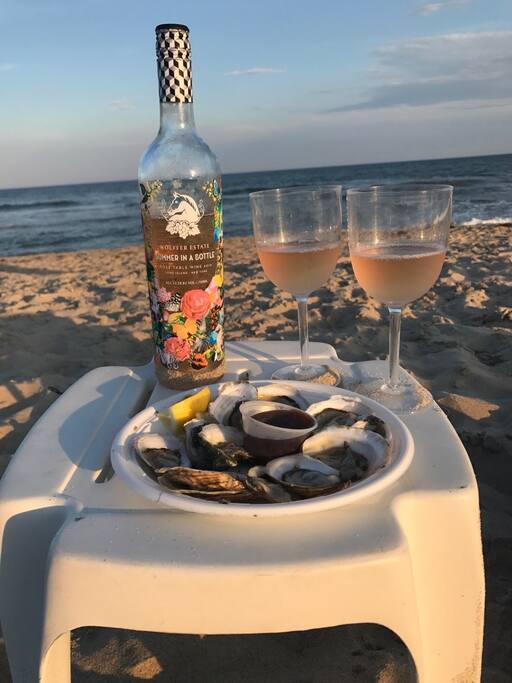 Sunset on the beach, the seafood shop is right by the house, as is the Wolffer winery!