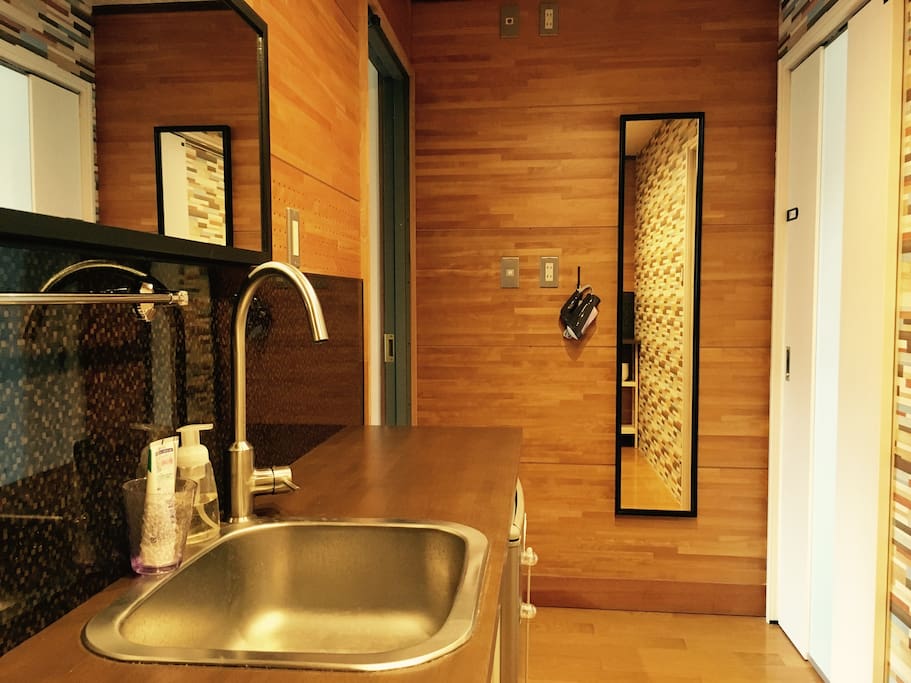 Washstand, fridge, drier and mirrors