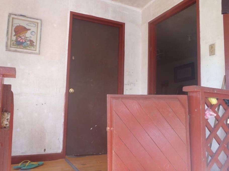 This is entrance of share house, you can go shower and Toilet inside. Your tent yard is in front.