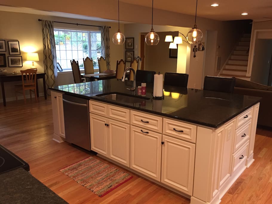 Kitchen view w/ bay window in background