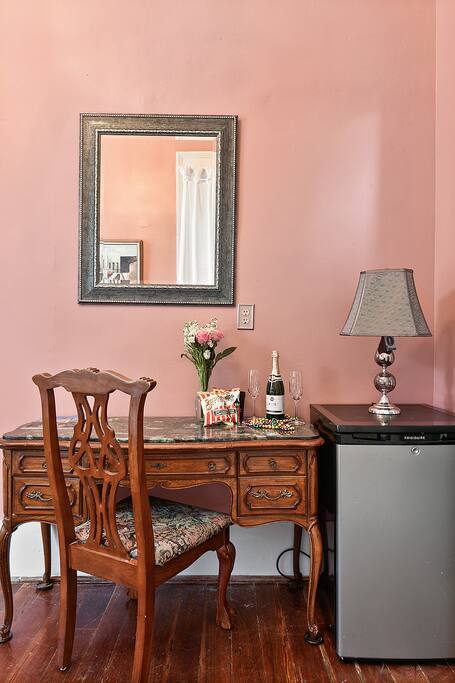 Perfect for business travel, a desk sits in the corner for your laptop usage.