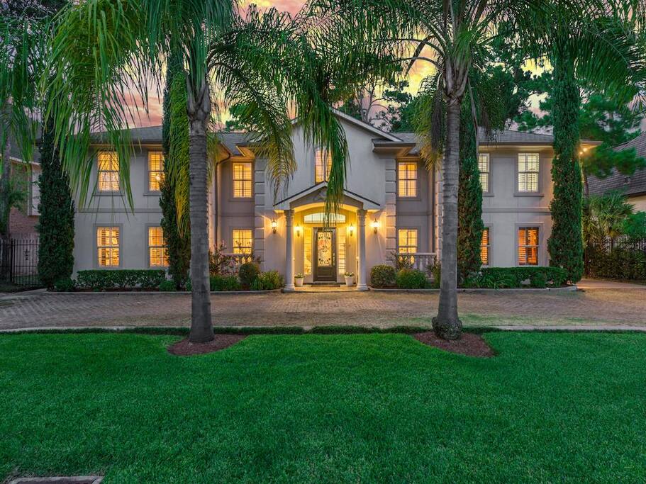 Gorgeous Stucco home with classic symmetry in the sought after Memorial Villages area.