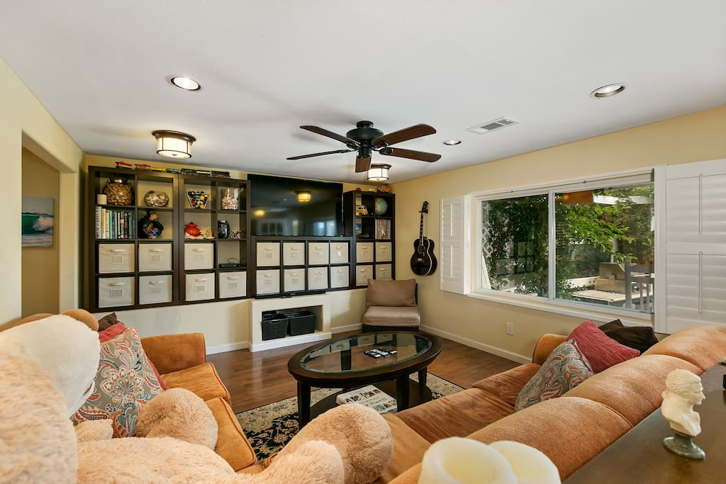 Wall-mounted 55" flat-screen for movie nights