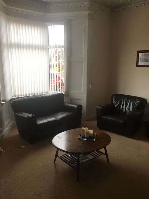 Living room. 3 seater, 2 seater and 1 seater chairs. Virgin TV including Sky Sports and BT sports. 100Mbps WiFi.