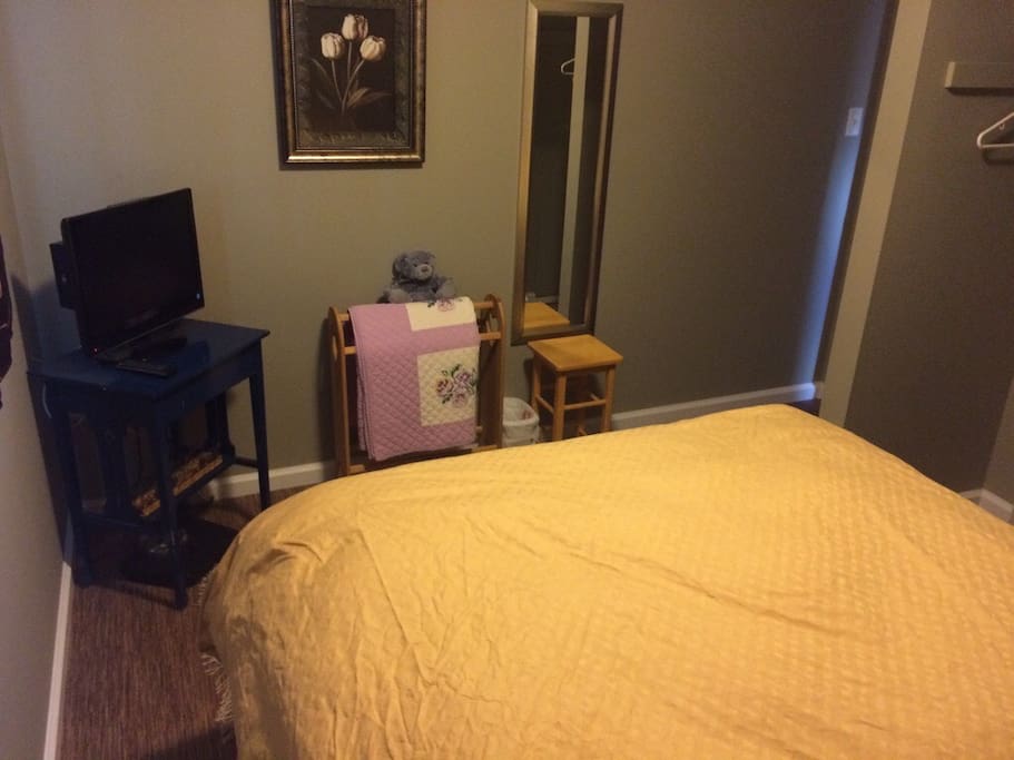 Upstairs bedroom with Manhatton Queen bed with tv and wifi.