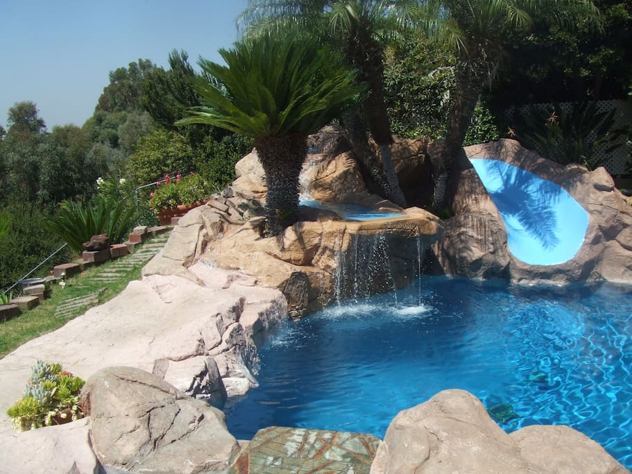 Your own private water fall with a water slide.