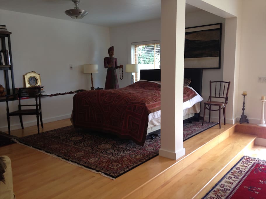 bed on raised platform