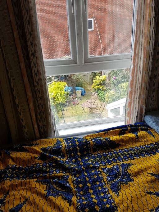 You can see the garden from your bed