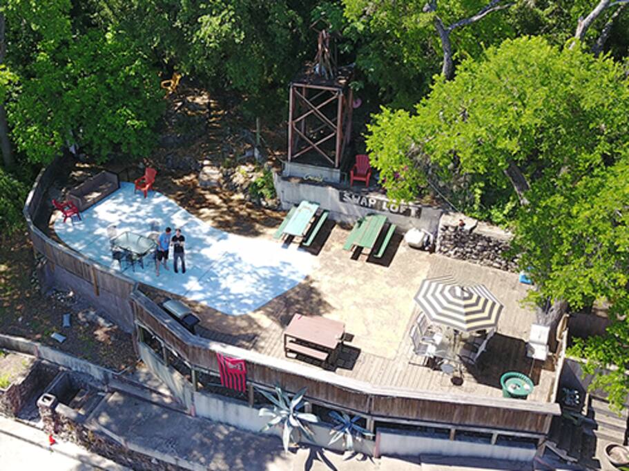 A Drone Shot of our WiFi Enabled Patio! We have power plugs, a bluetooth speaker, and fun games like Cornhole so you will have a ton of room for work and play.