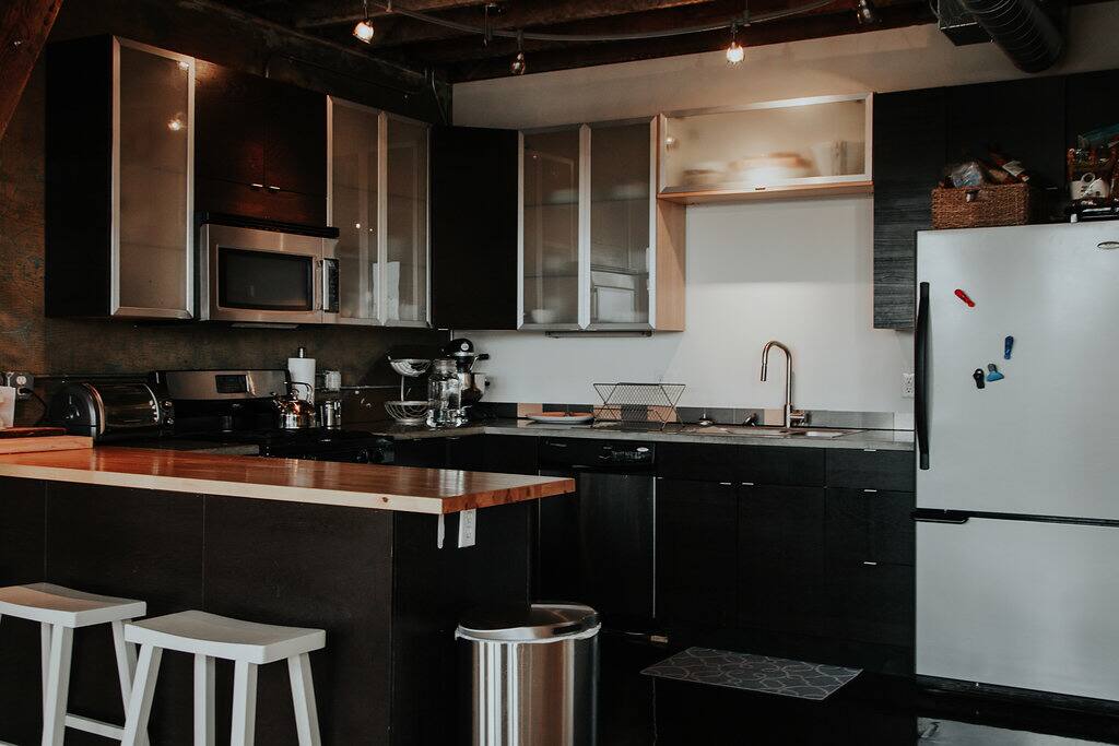 Full kitchen includes all pots and pans for cooking plus cooking supplies. The extra bedroom loft is just above this space.
