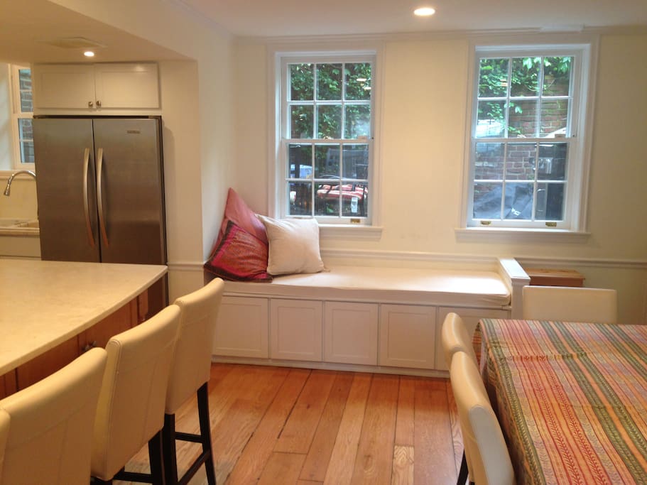 Newly renovated kitchen with day bed.