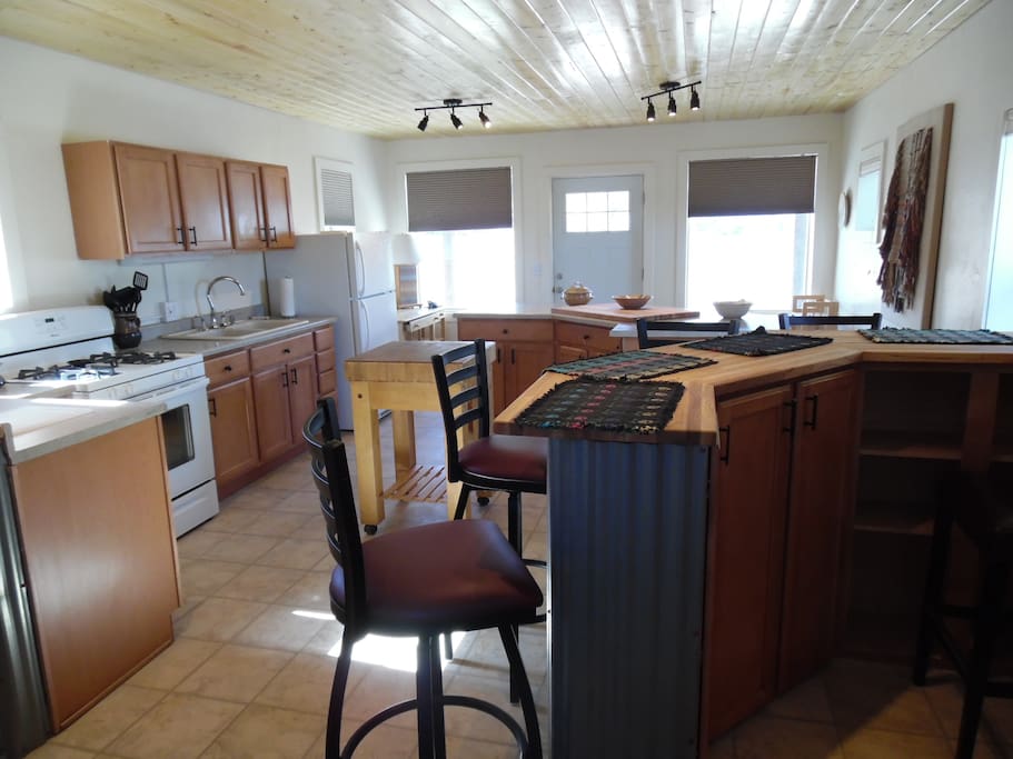 View of the Kitchen from the Bathroom door.