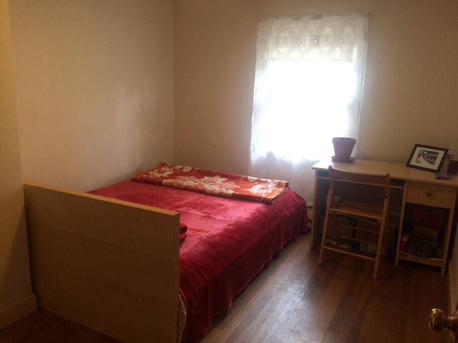 bedroom with Queen size bed, and desk