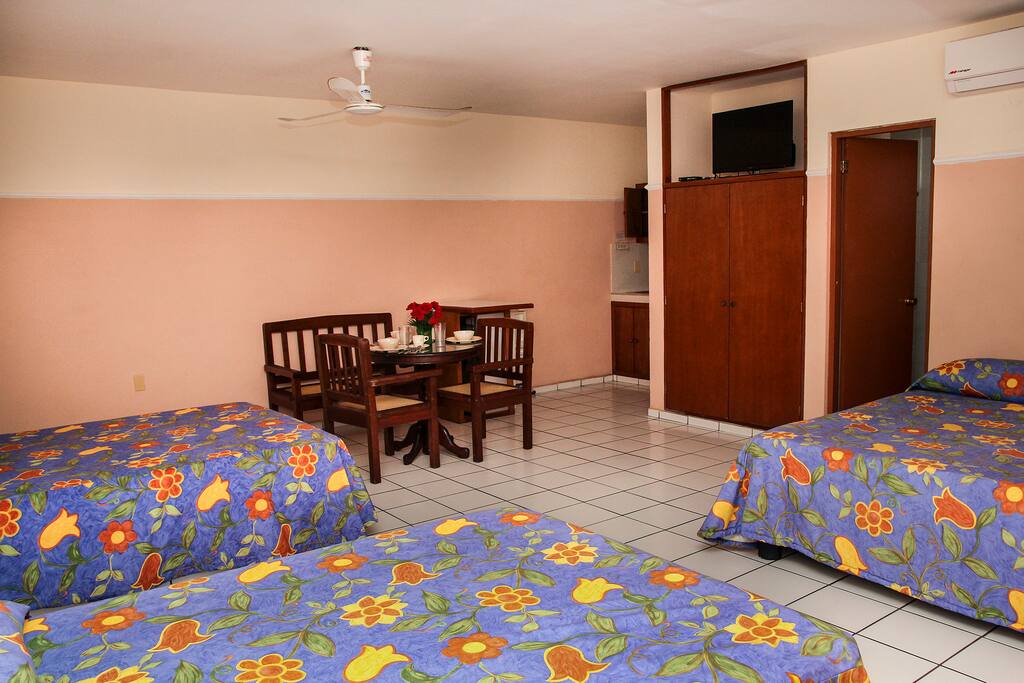 Habitación de 3 camas matrimoniales
