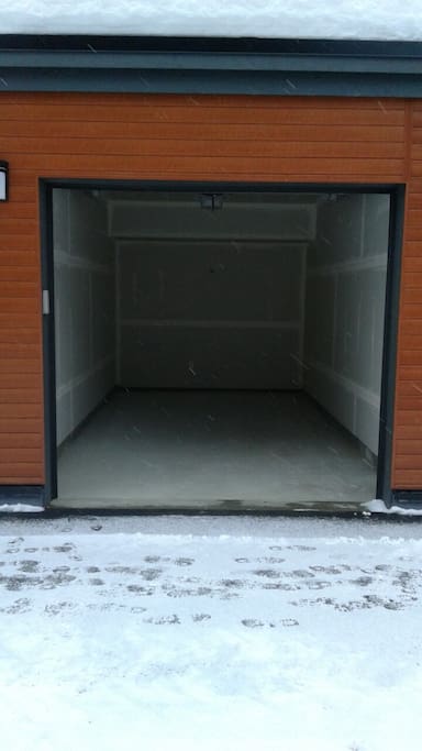 Private garage, and a visitor parking spot