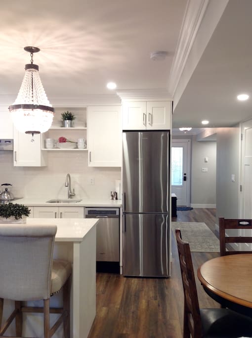 Open concept kitchen, dining, and living room.