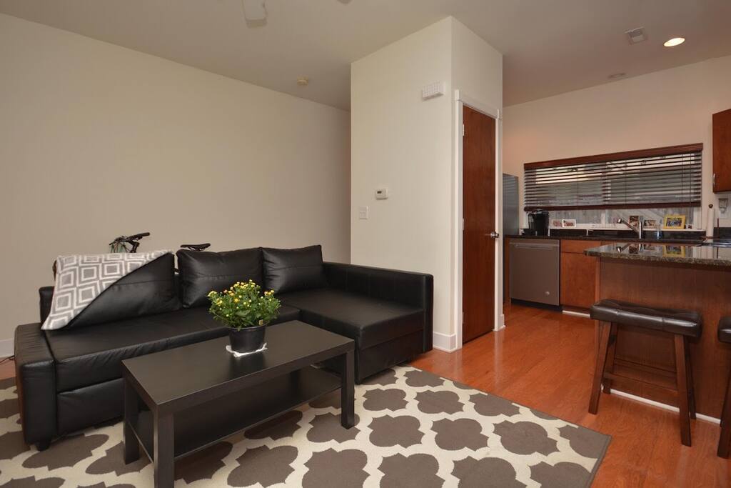 Open concept kitchen and living area provide ample space for comfort.