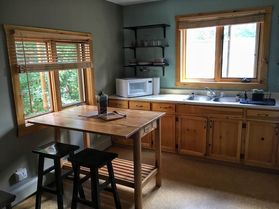 Kitchen fully supplied for cooking and dining