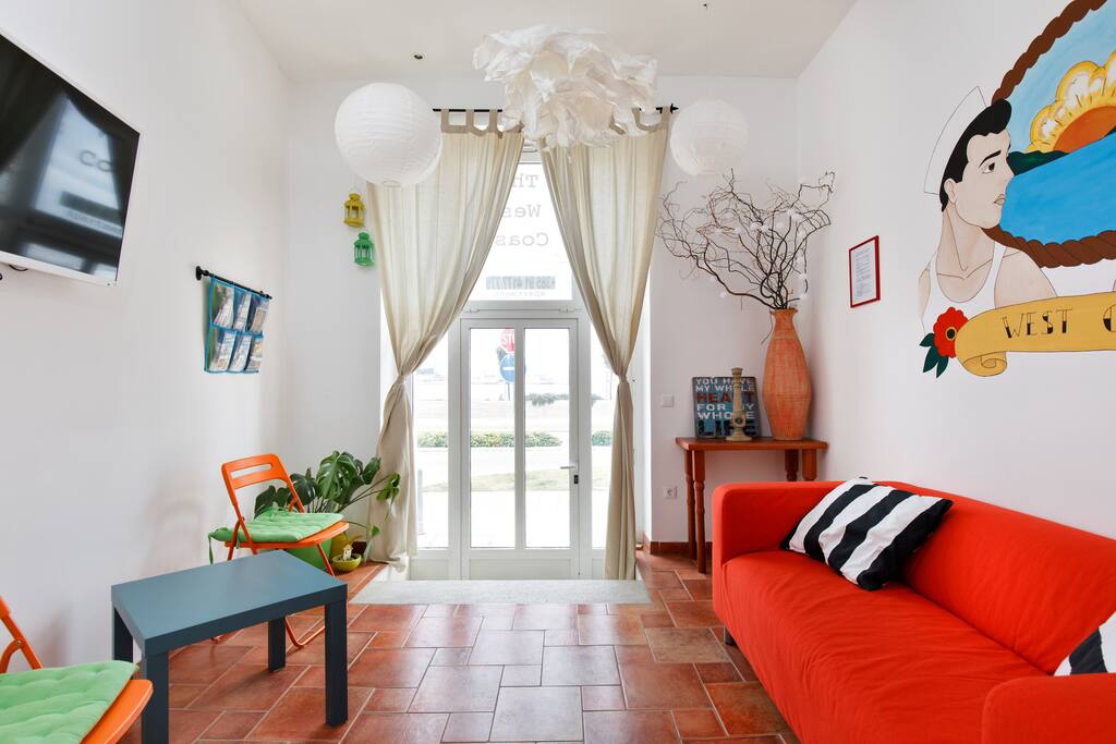 Spacious and light entrance, lounge area for relax and watch TV