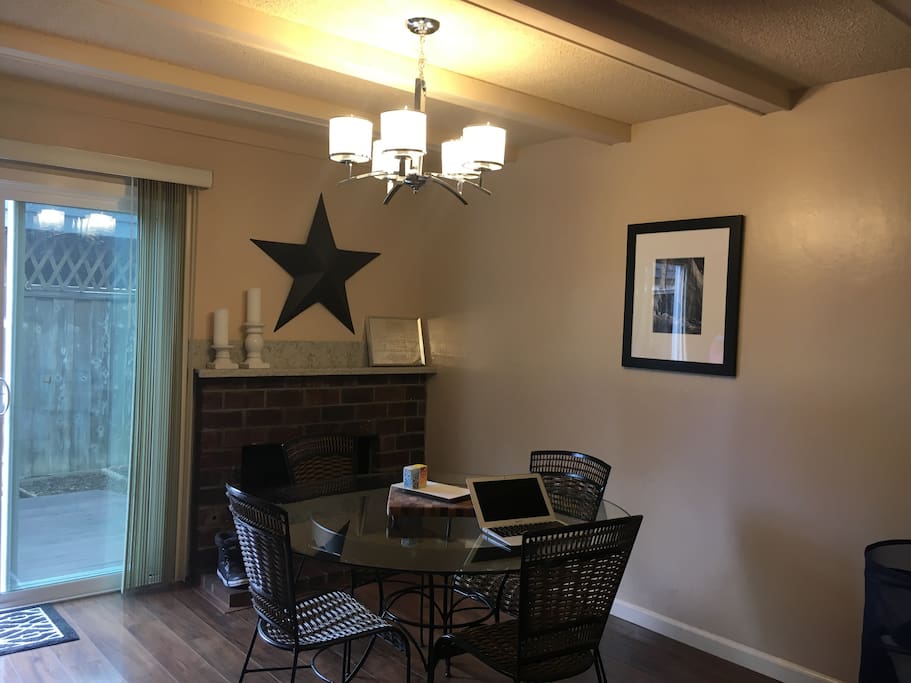 Kitchen dining area doubles as workspace.