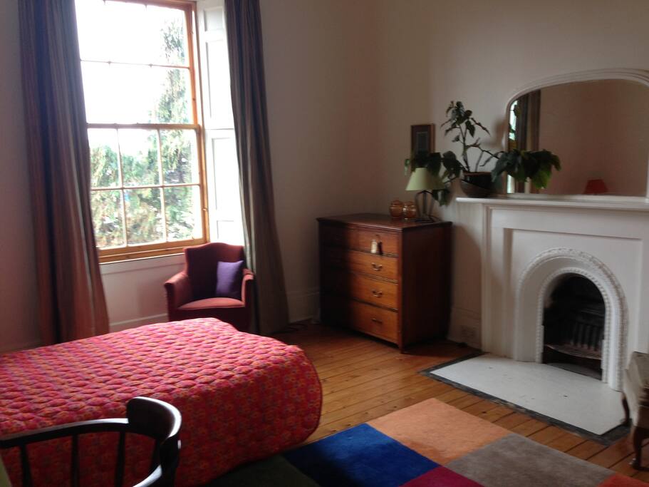 Double bedroom, light and comfortable, with views over Arthurs Seat and old town/city beyond....