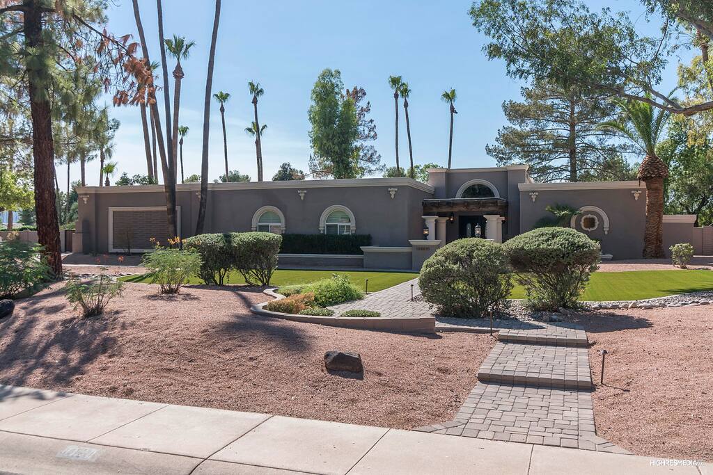 Acre of well-manicured resort like property