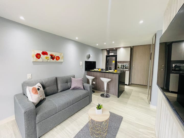 Comfortabele woonkamer, ideaal om te ontspannen na het verkennen van de stad.