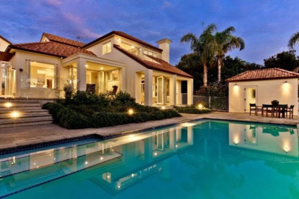 Backyard with pool and sauna house