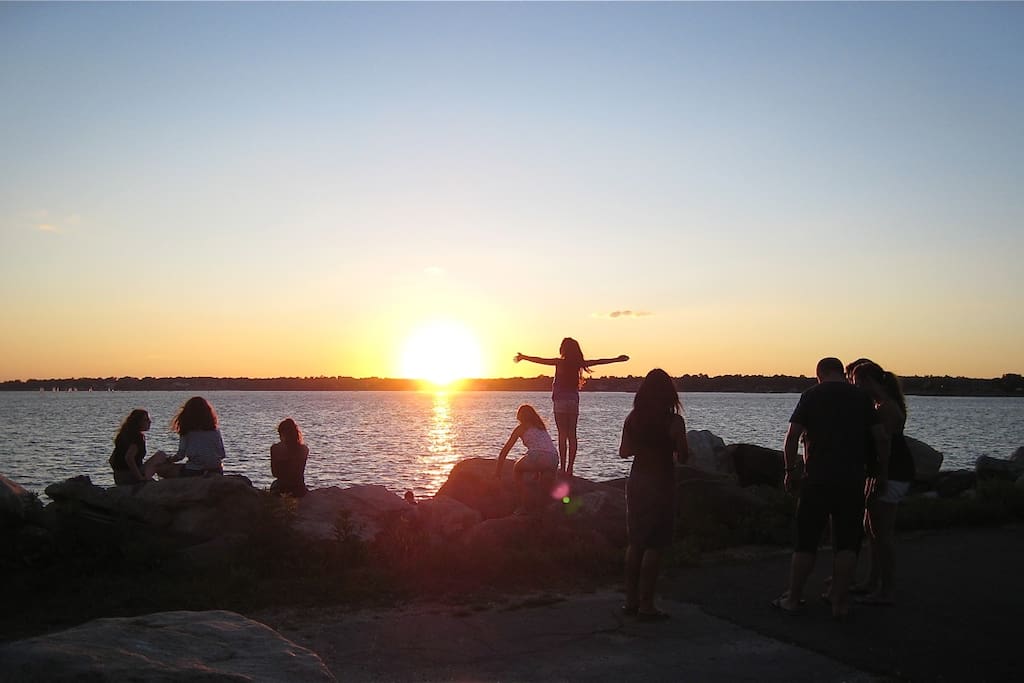 SUNSET WORSHIPERS AT GREENWICH POINT.