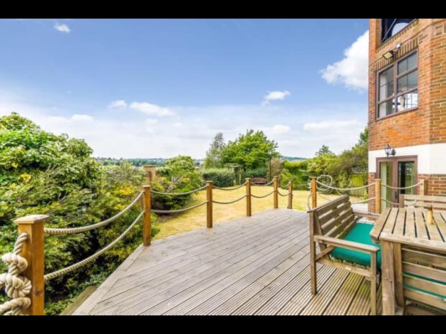 Outside dining area on wooden deck