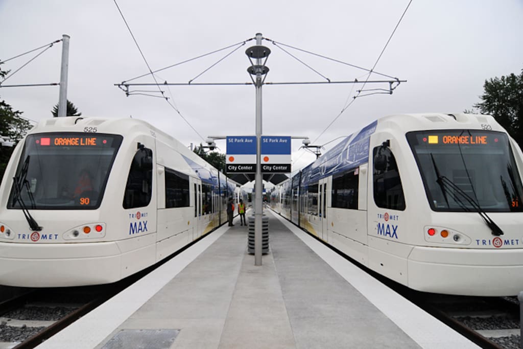 MAX light rail trains with efficient, scenic service to downtown Portland. Nearby station at SE Park Ave. is a 5-10 minute walk. Travel time is 15 min. to SE Division/Clinton neighborhood, 20 min. to South Waterfront / OHSU, and 25 min. to downtown Portland.