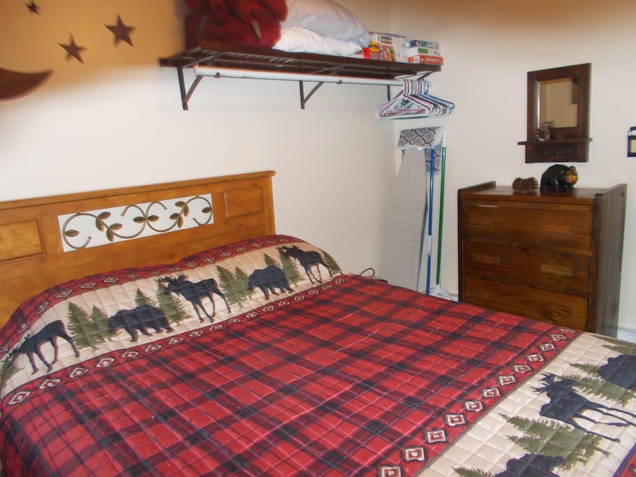 Queen size bed in second bedroom and a dresser for your use