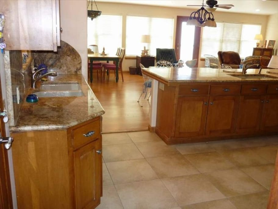 Back door entrance takes you into new remodeled kitchen with 2 sinks so you can enjoy the view while prepping in the kitchen.