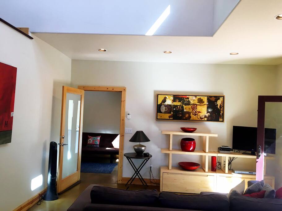 Living room and entrance to the connected breezeway.
