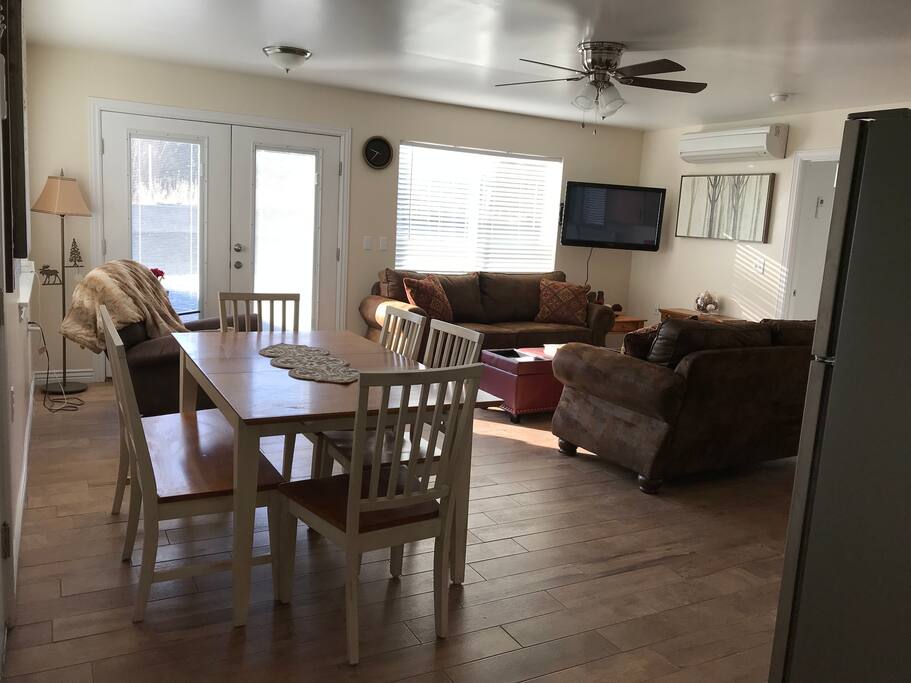 Sofa makes into bed & if needed for handicapped, we can add an automatic air adjusting air bed for needed height. Wheelchair ramp to French doors, totally accessible from parking area