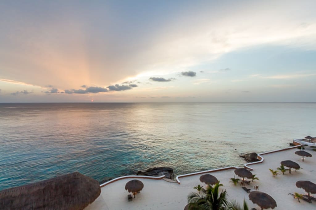 Shaded palapas are the perfect place to lounge oceanside