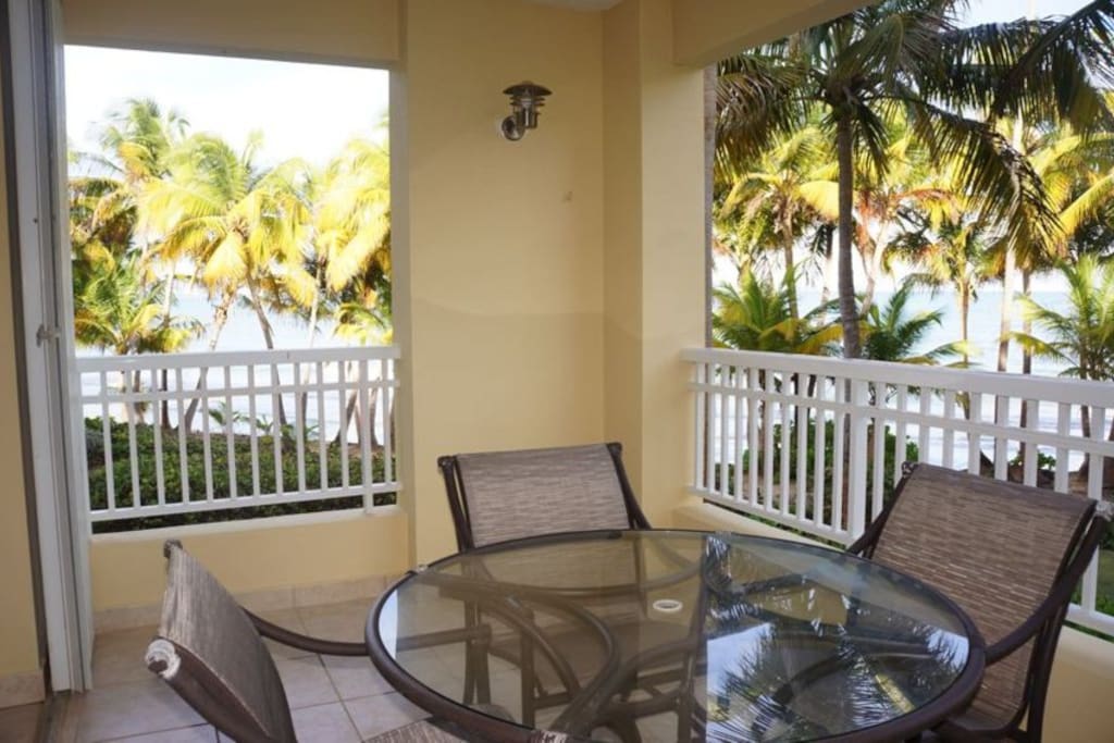 Our porch with wide views of the ocean. Listen to the waves as you enjoy a refreshment!