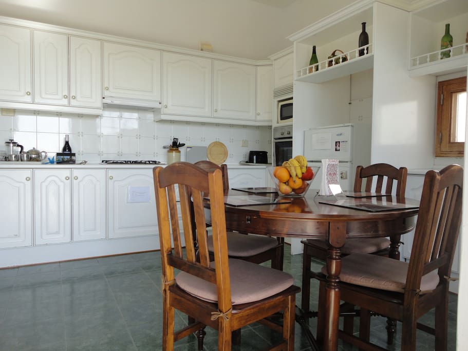 Large & well equipped kitchen, with patio doors to the breakfast terrace!