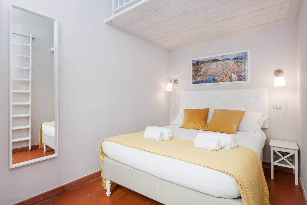 The Bedroom - The comfortable double bed with soft bed-linen and towels