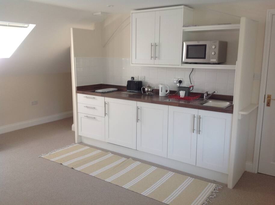Toaster, kettle, microwave and crockery etc