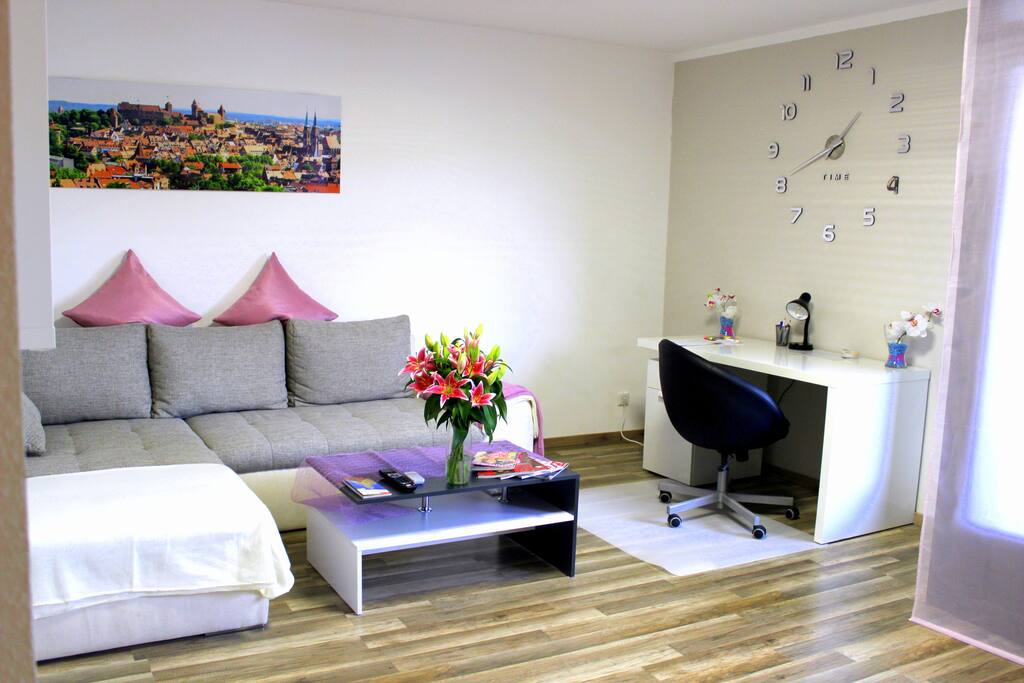 Living room - big, bright, with a worktable