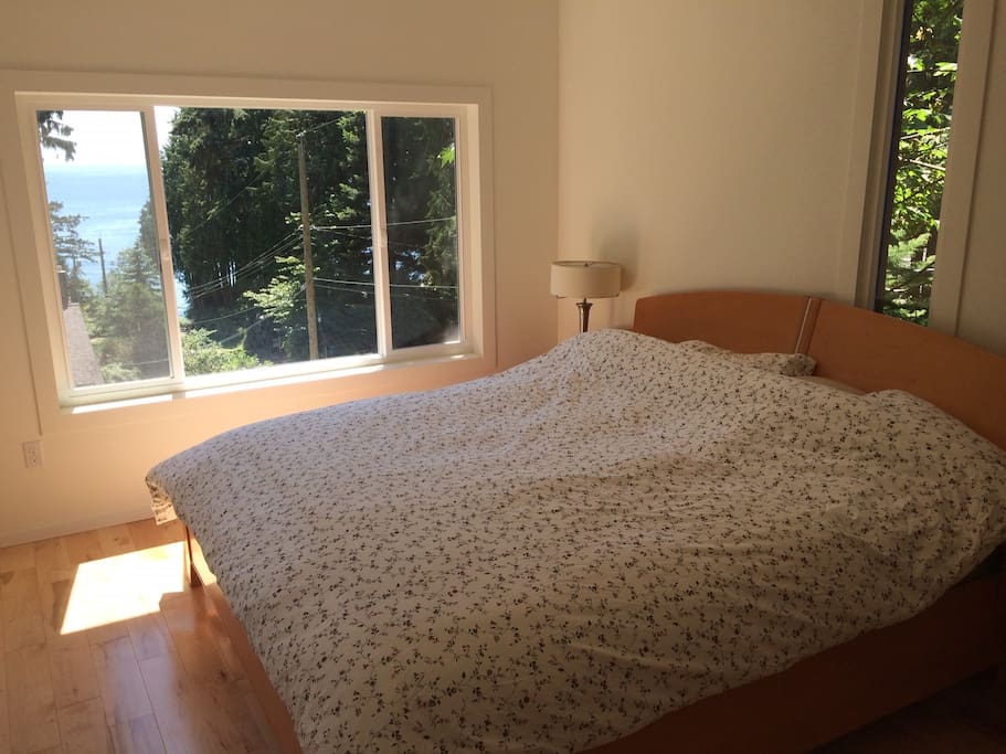 Sleep soundly in the master bedroom's king bed and wake up to the ocean view